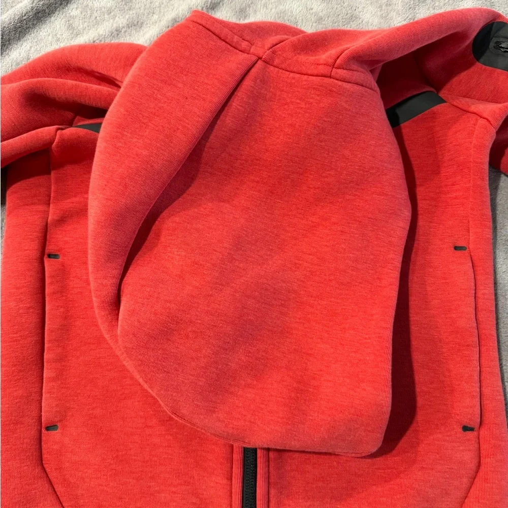 Nike Red Zip-Up Hoodie with Black Trim.Pre-Loved. Note circled flaw on  sleeve.